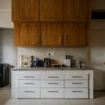 Minimalist kitchen counter with cabinets,